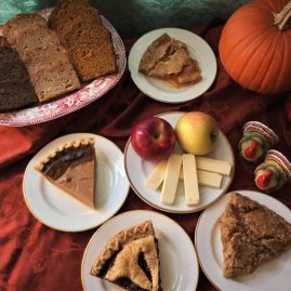 The perfect fall assortment of goodies. Fresh bread and pie, cheddar cheese...and apples.